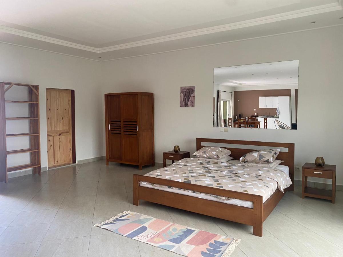 L'Oasis Guesthouse Cotonou Exterior foto