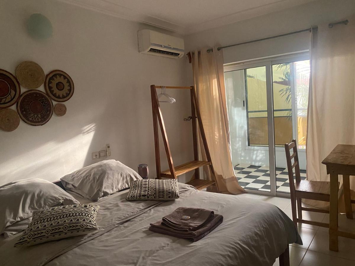 L'Oasis Guesthouse Cotonou Exterior foto