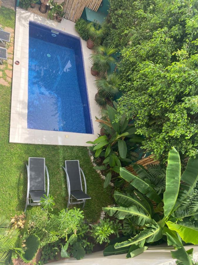 L'Oasis Guesthouse Cotonou Exterior foto