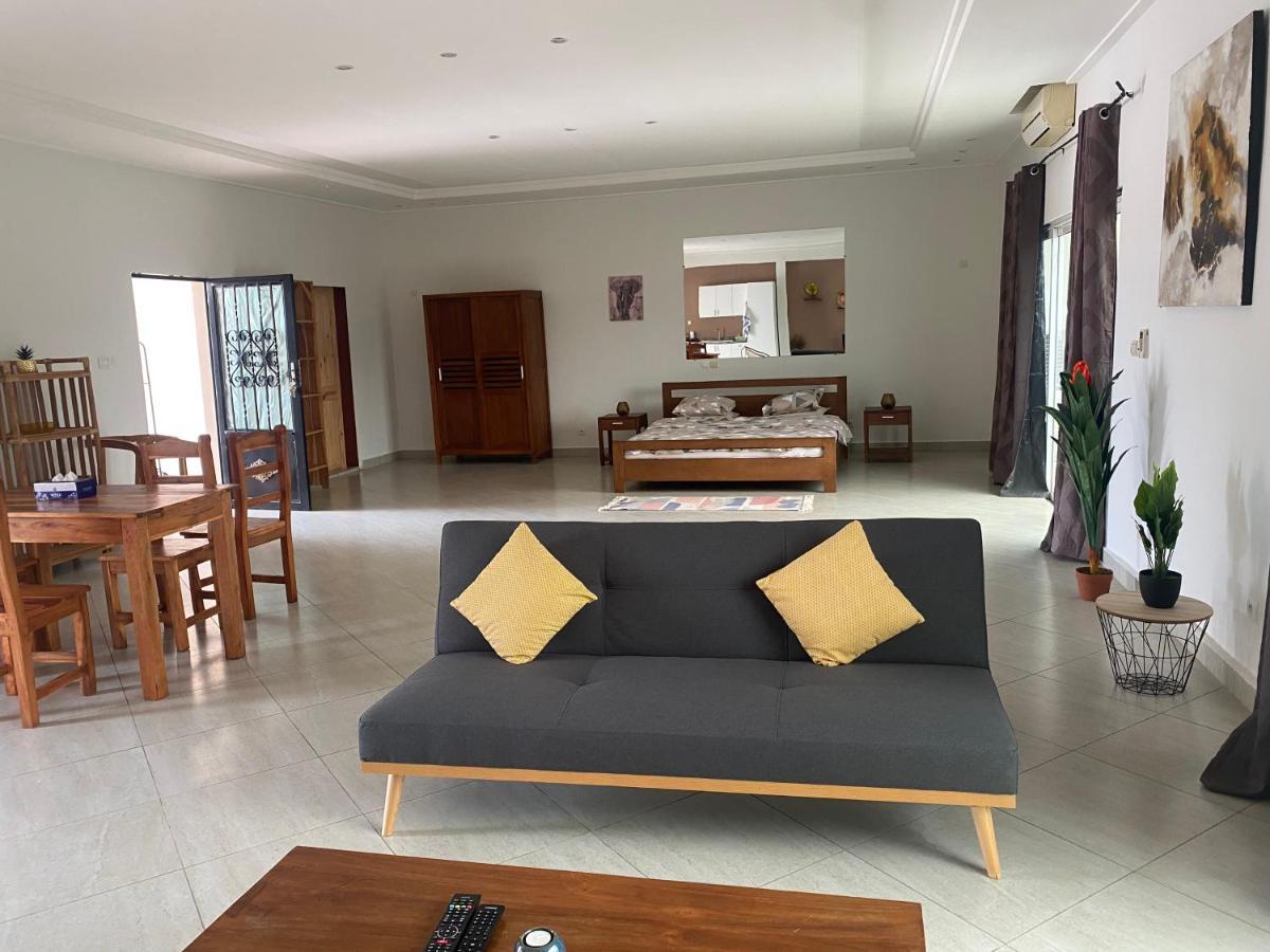 L'Oasis Guesthouse Cotonou Exterior foto