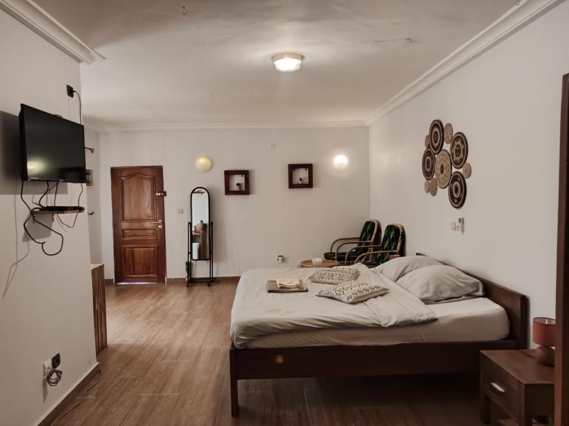 L'Oasis Guesthouse Cotonou Exterior foto