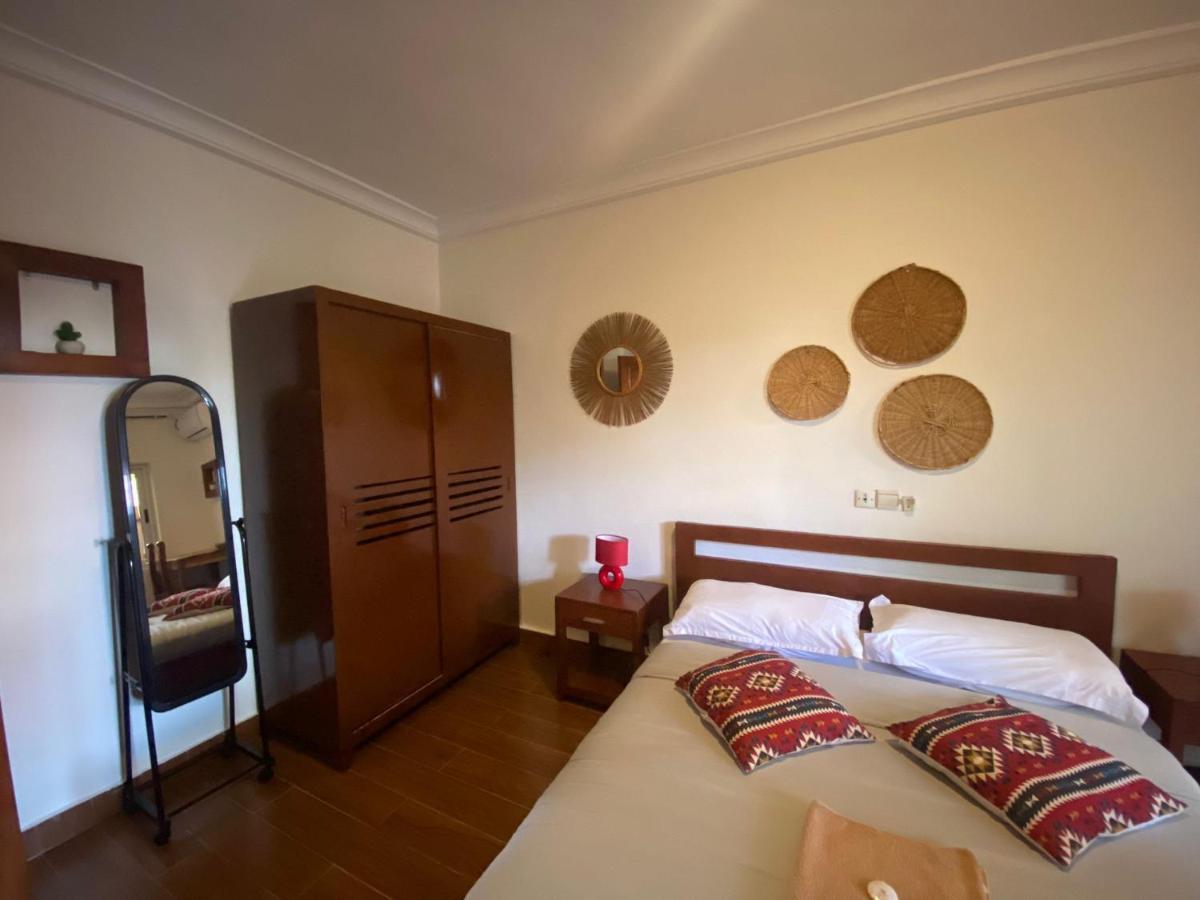 L'Oasis Guesthouse Cotonou Exterior foto