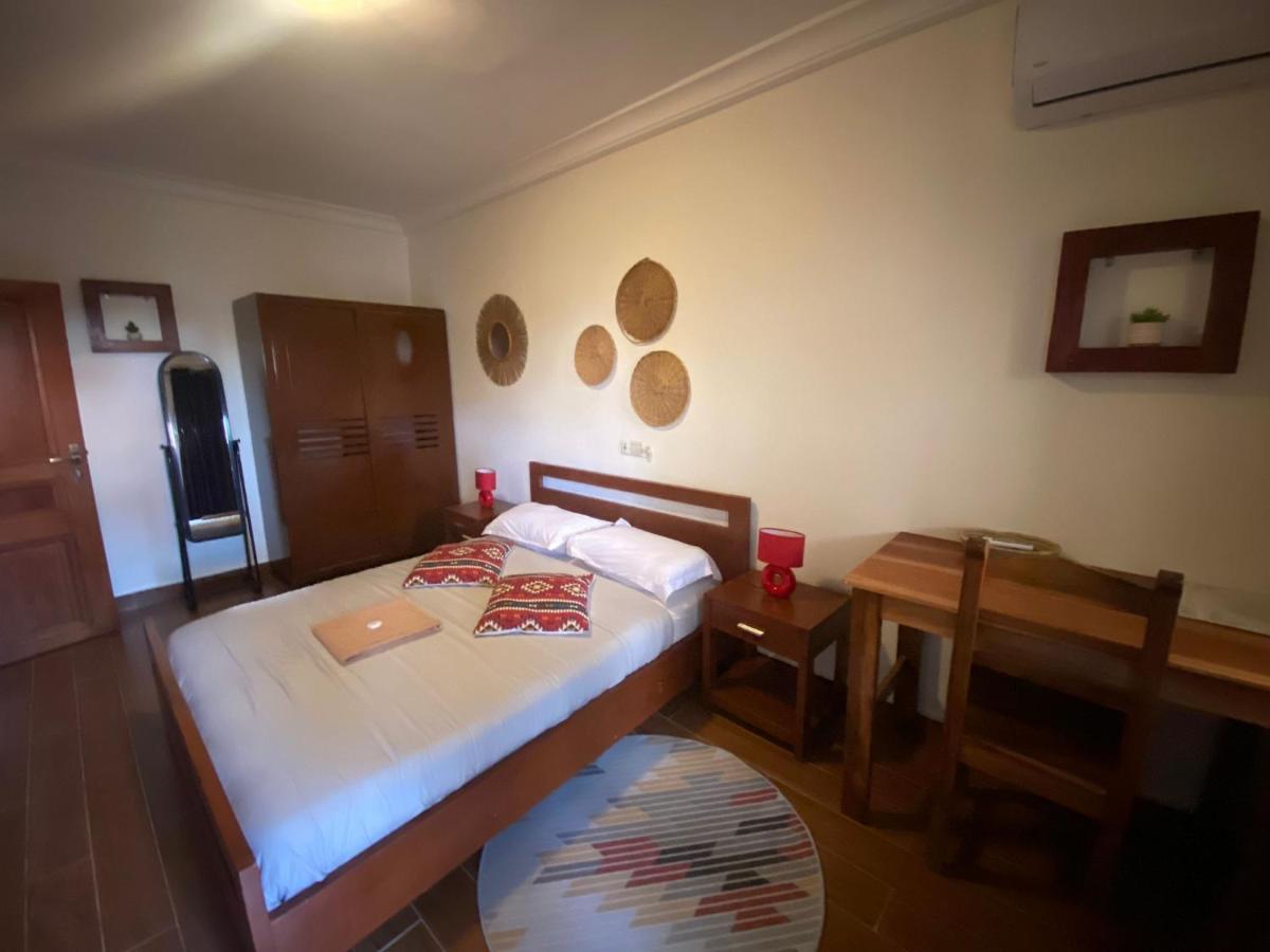 L'Oasis Guesthouse Cotonou Exterior foto