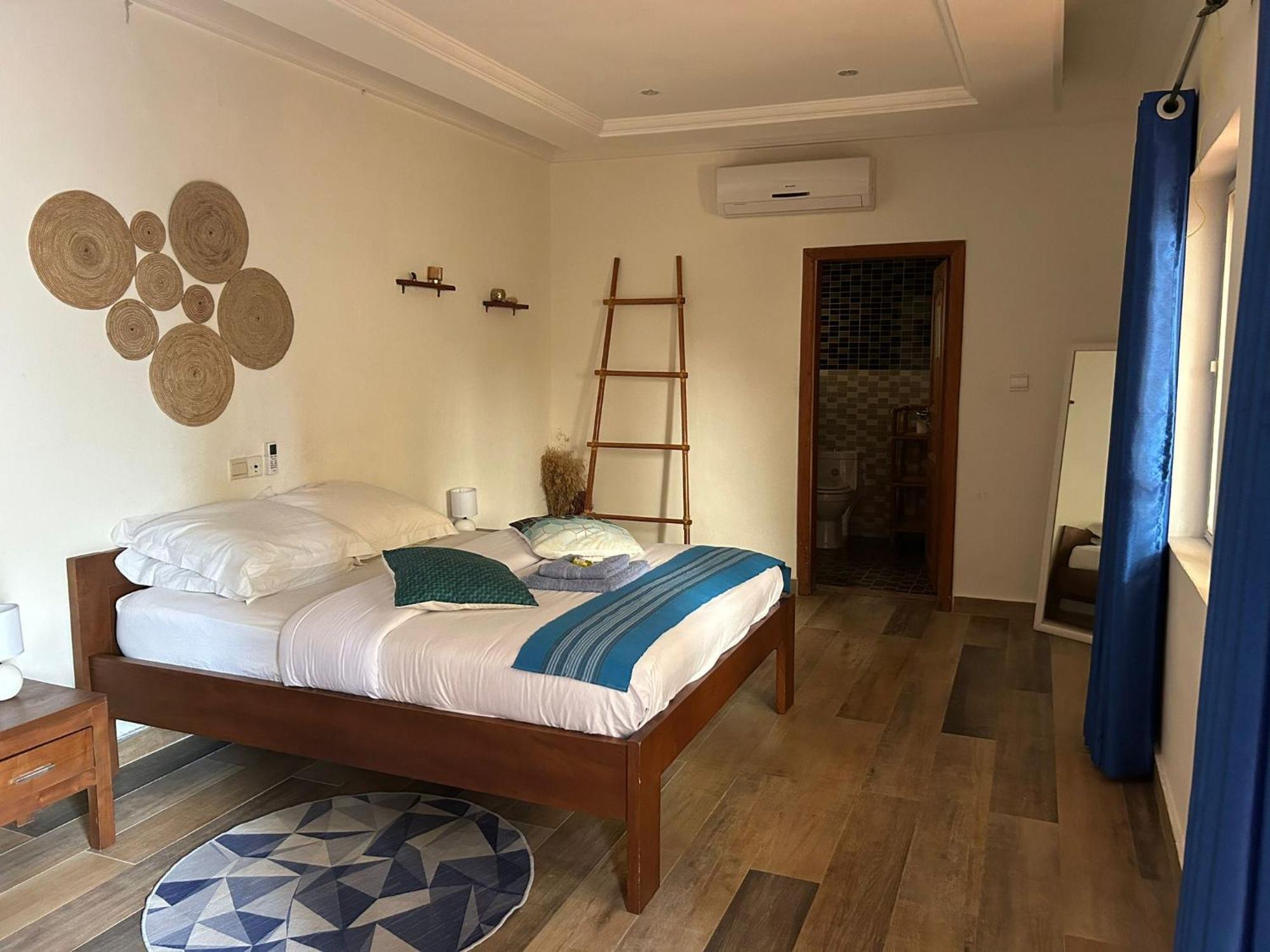 L'Oasis Guesthouse Cotonou Exterior foto