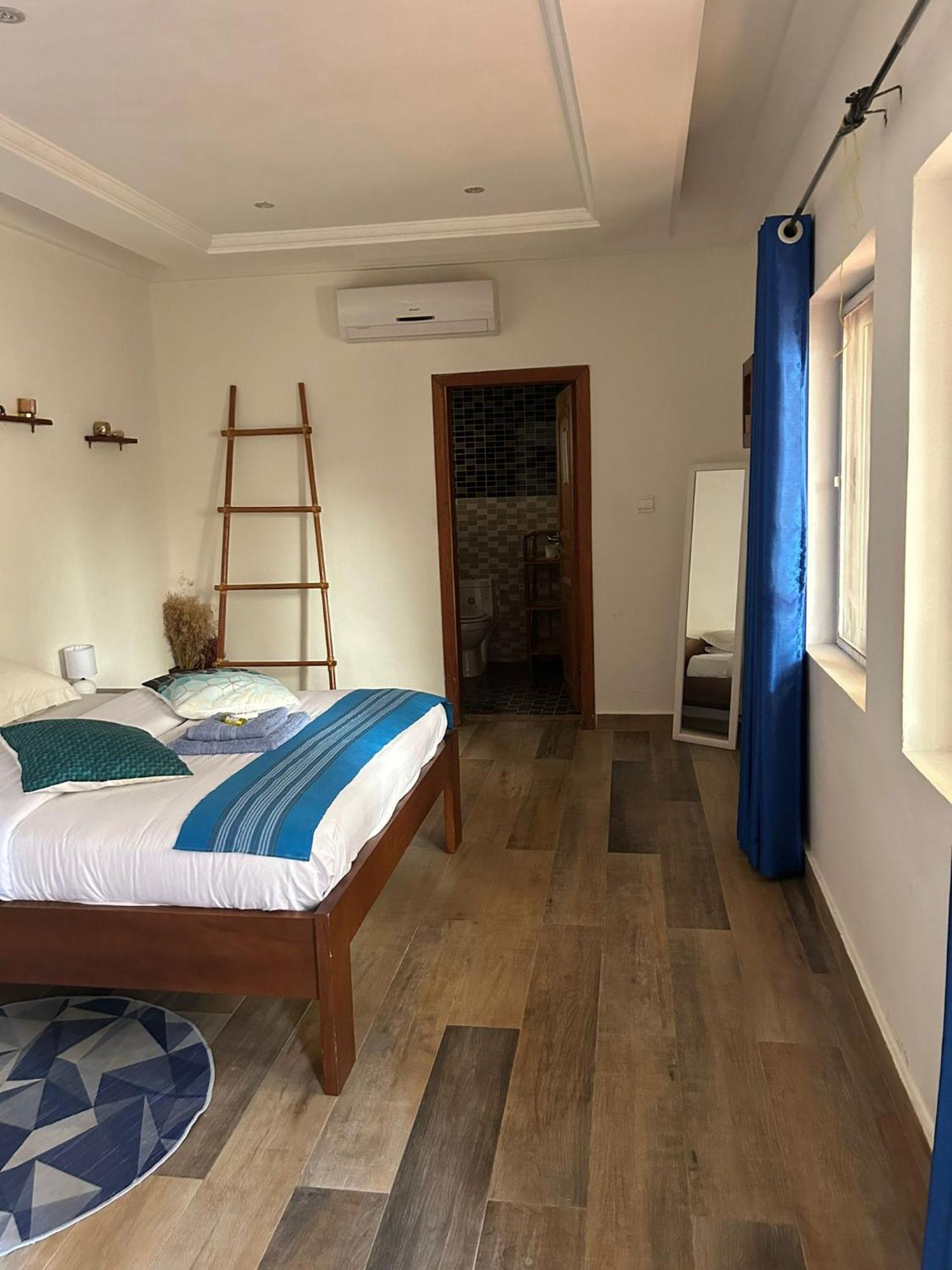 L'Oasis Guesthouse Cotonou Exterior foto