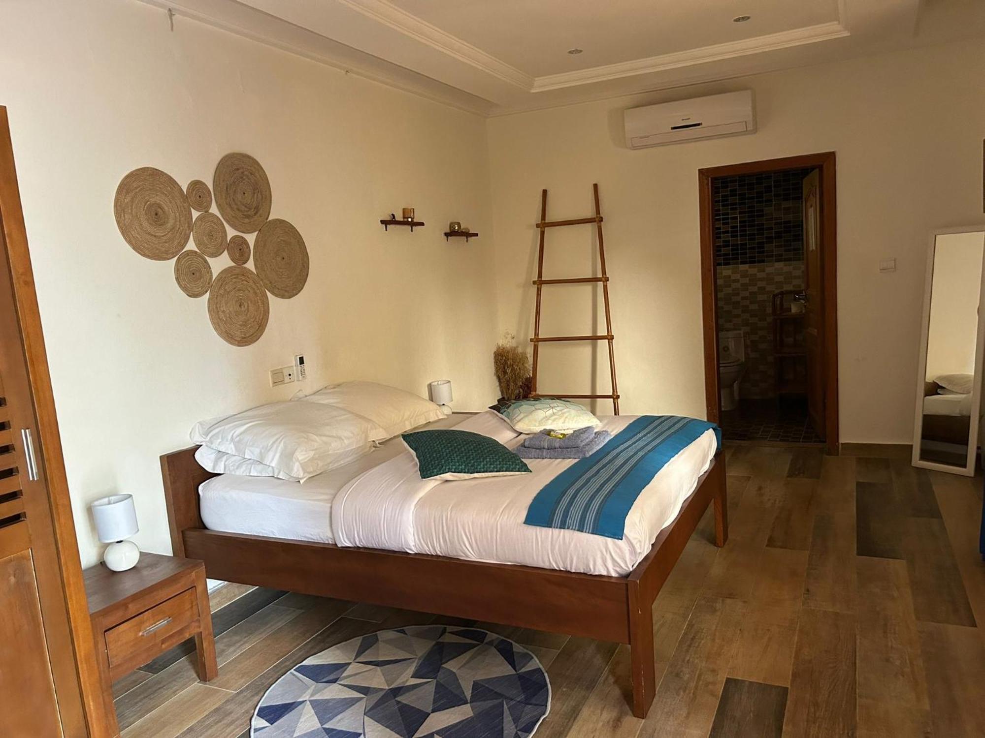 L'Oasis Guesthouse Cotonou Exterior foto