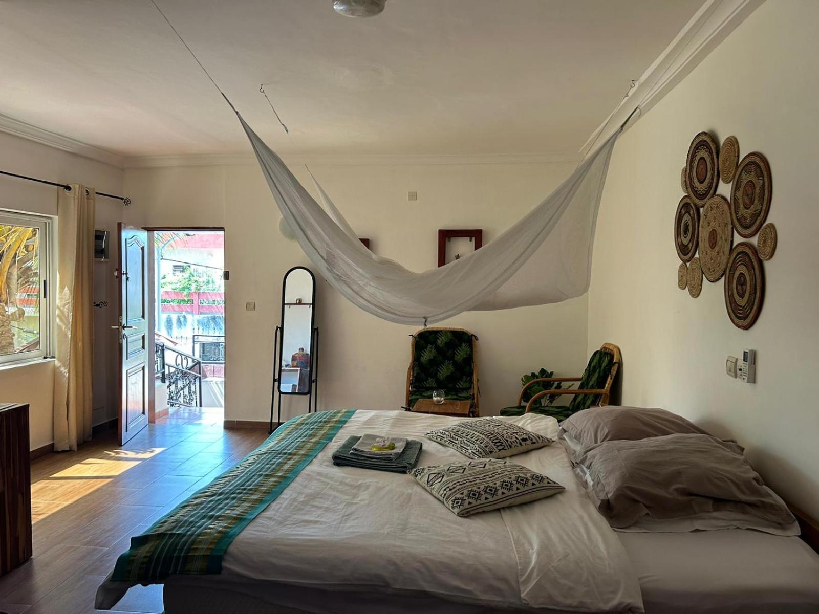 L'Oasis Guesthouse Cotonou Exterior foto