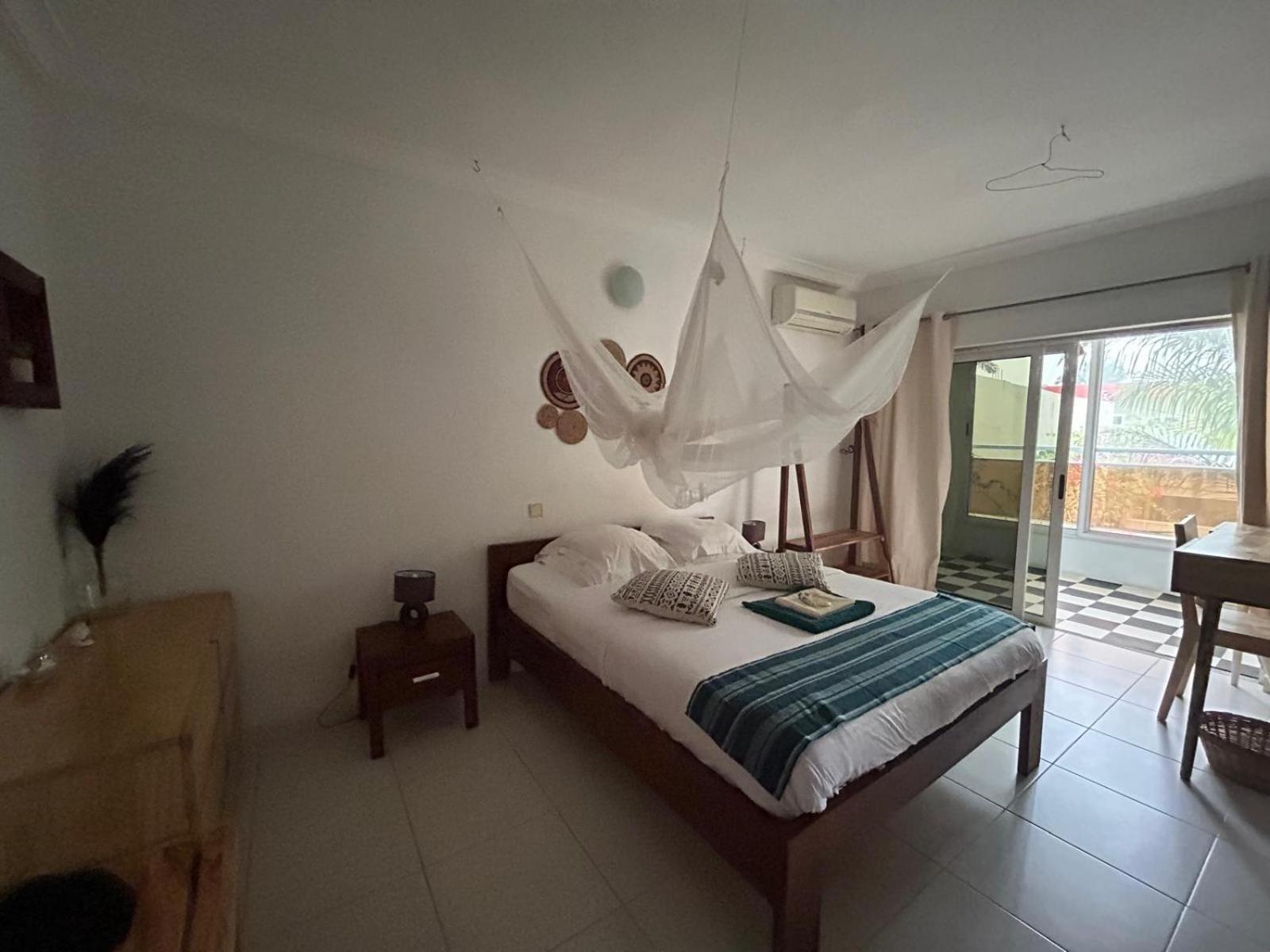 L'Oasis Guesthouse Cotonou Exterior foto