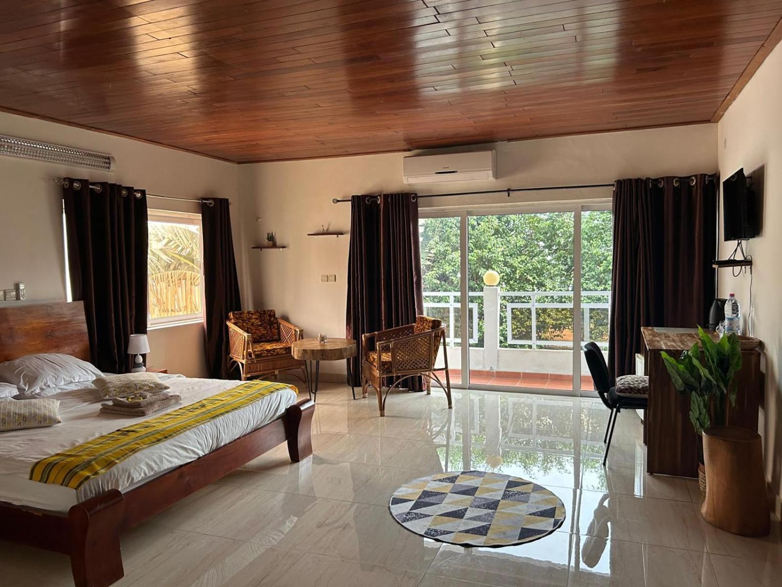 L'Oasis Guesthouse Cotonou Exterior foto