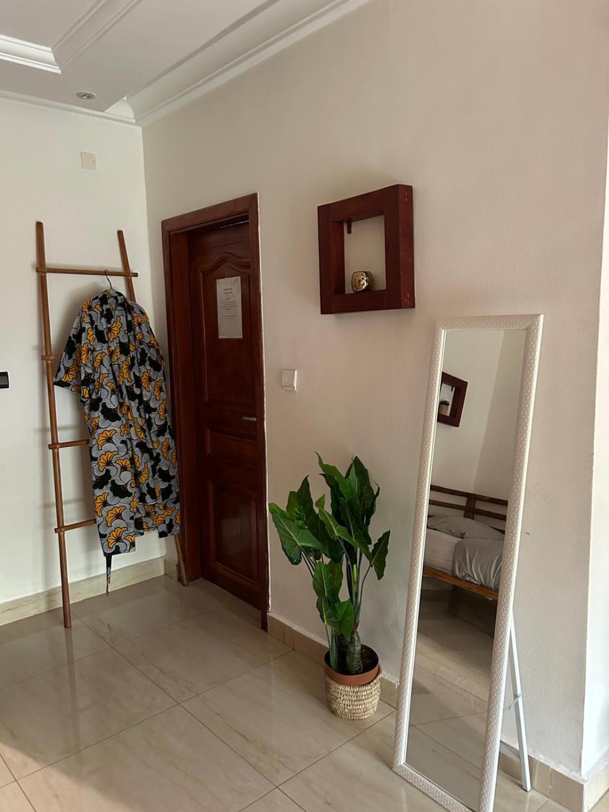 L'Oasis Guesthouse Cotonou Exterior foto