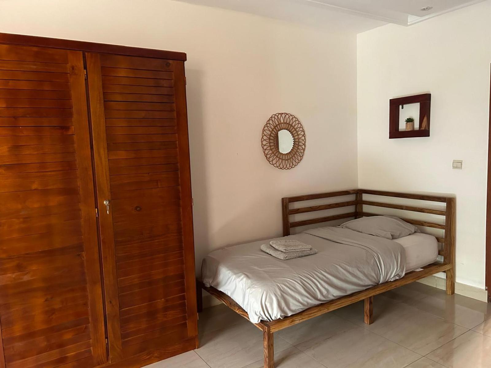 L'Oasis Guesthouse Cotonou Exterior foto