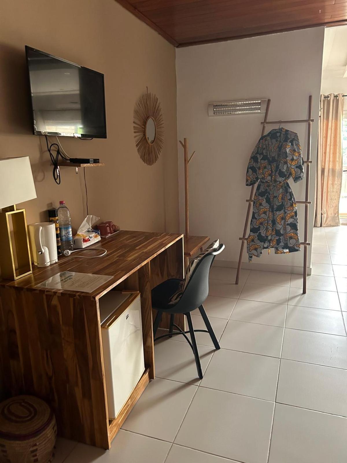 L'Oasis Guesthouse Cotonou Exterior foto