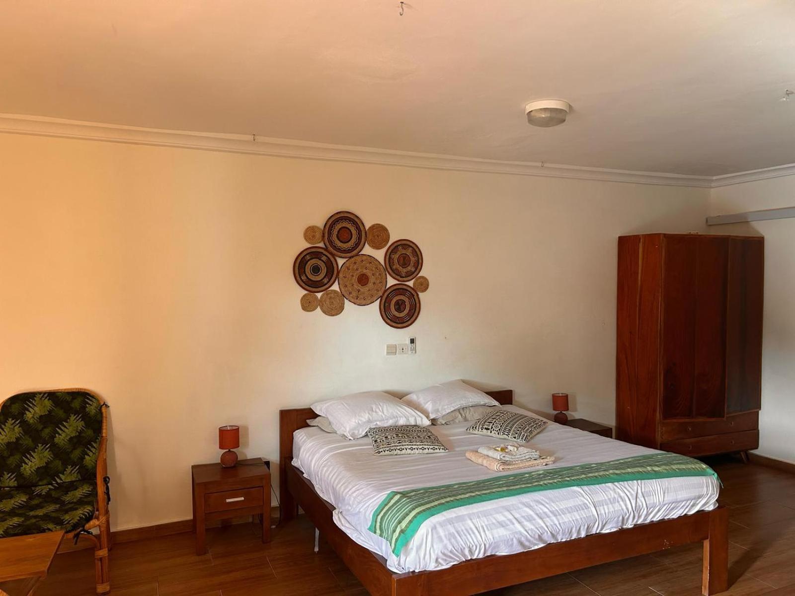 L'Oasis Guesthouse Cotonou Exterior foto